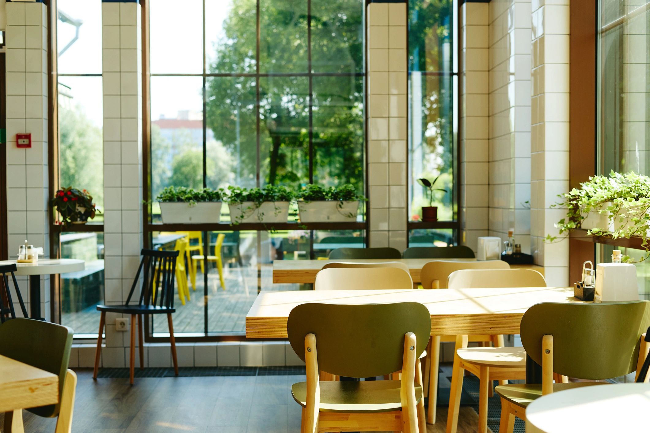 Warm dining tables inside a modern restaurant